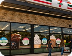 7-Eleven storefront window graphics promoting the beverage bar