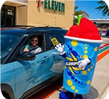 7-Eleven mascot at a grand opening event